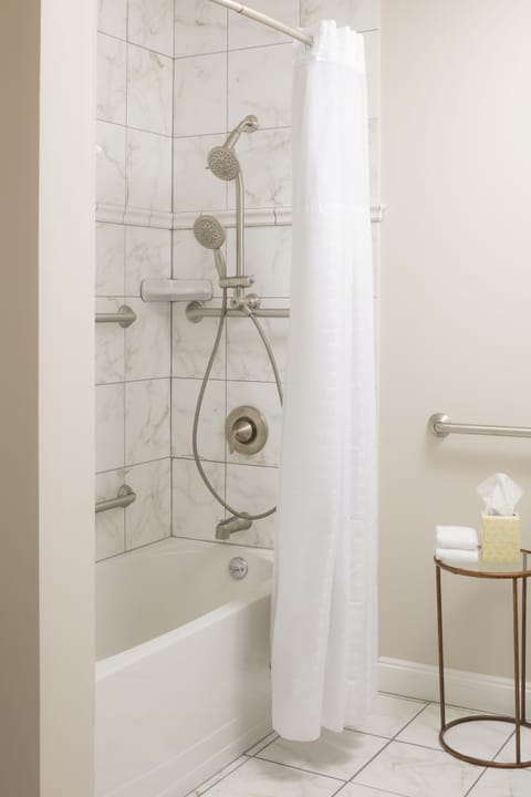 Family Suite, 1 Bedroom | Bathroom | Combined shower/tub, free toiletries, hair dryer, towels