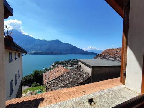 Water, Sky, Mountain, Azure, Cloud, Wood, Building, Real Estate, Mountainous Landforms