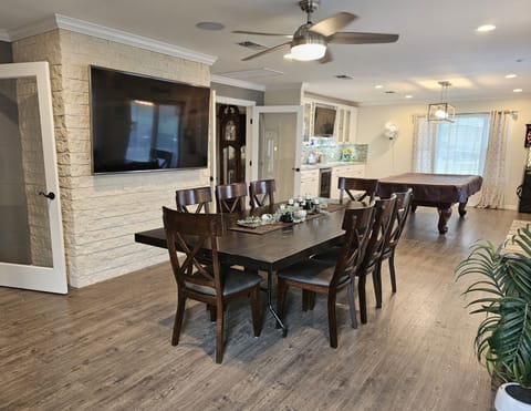 Watch the entertainment at the bar /pool table.