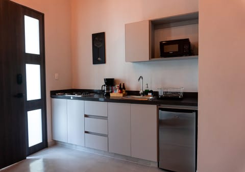 Deluxe Room | Private kitchen | Mini-fridge, coffee/tea maker