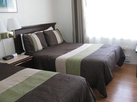 Classic Room, 2 Double Beds | Iron/ironing board, rollaway beds, free WiFi, bed sheets