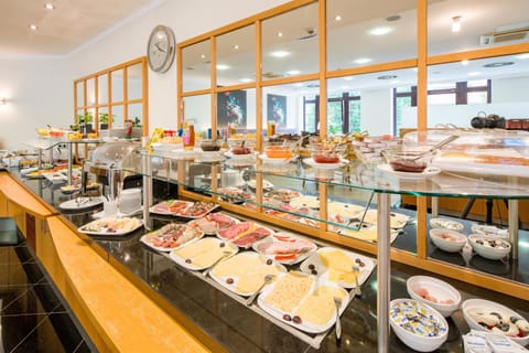 Daily buffet breakfast (EUR 18 per person)