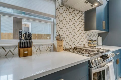 Kitchen Bliss Awaits: Our Fully Equipped Kitchen Comes Complete with All the Amenities and Utensils You Need. It's Fully Stocked for Your Culinary Adventures!