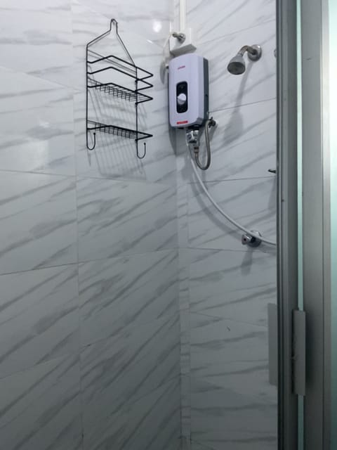 Basic Single Room | Bathroom | Shower, towels, soap, shampoo