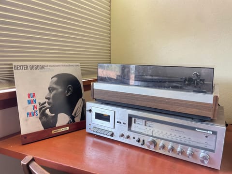 Turntable and receiver in Bedroom 3/Music room