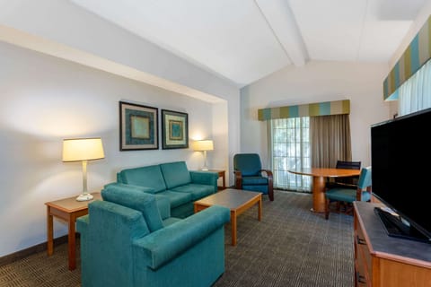 Family Suite, 1 King Bed, Non Smoking | Premium bedding, pillowtop beds, desk, blackout drapes