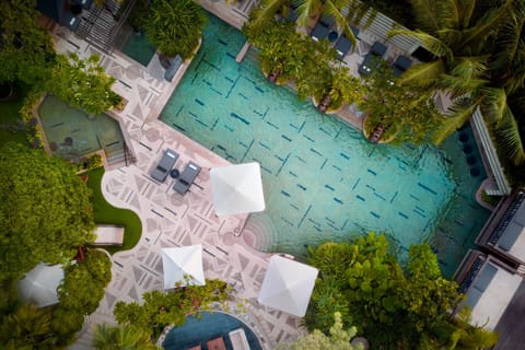 Outdoor pool, open 6:00 AM to 7:00 PM, free cabanas, pool umbrellas