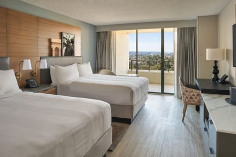 Room, 2 Queen Beds, Pool View | Premium bedding, in-room safe, desk, blackout drapes