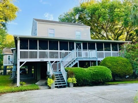 Full front of house with parking