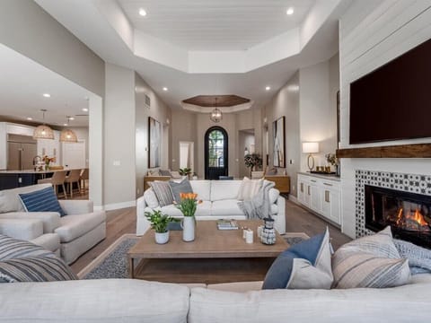 Open floor plan with a circular flow is optimal for living and entertaining.