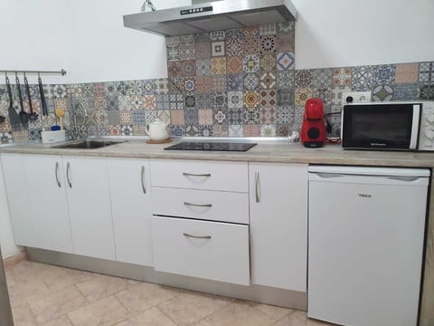 Basic Apartment, Ensuite (Duple Económico) | Shared kitchen