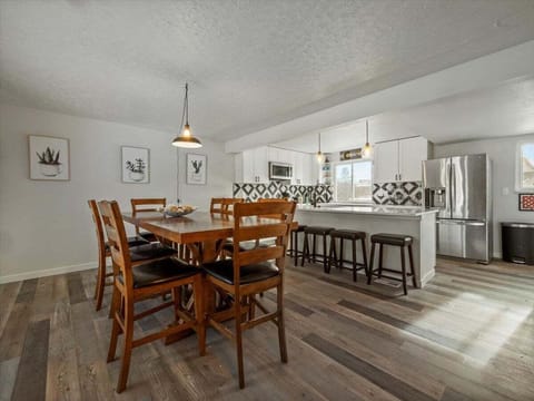 Plenty of room for 12 people to gather around the table and breakfast bar area! Ask us about coffee and other beverage amenities!