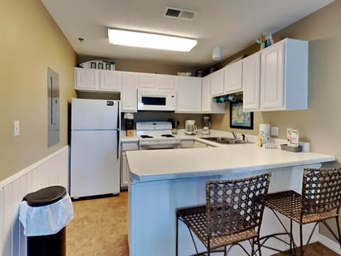 Condo, Multiple Beds, Balcony (#212 West - No Pets Allowed) | Private kitchen | Fridge, microwave, oven, stovetop