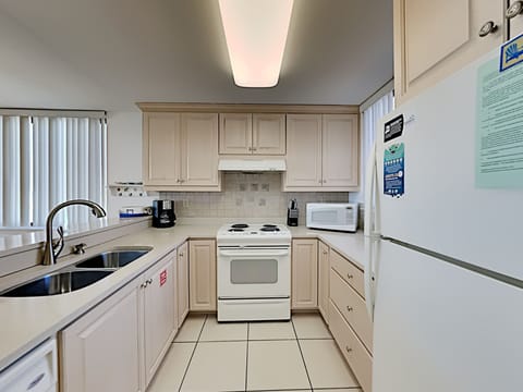 Condo, Multiple Beds, Balcony, Ocean View (#205 - No Pets Allowed) | Private kitchen | Fridge, microwave, oven, stovetop