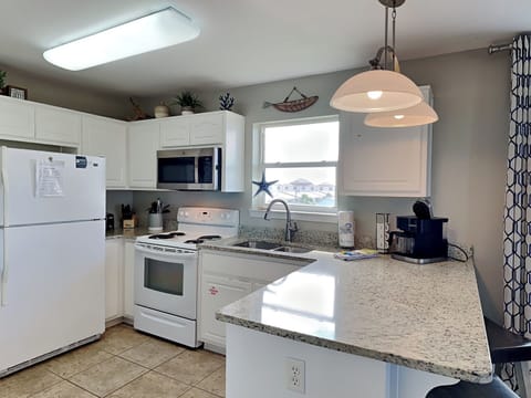 Condo, Multiple Beds, Balcony, Ocean View (#134 - No Pets Allowed) | Private kitchen | Fridge, microwave, oven, stovetop