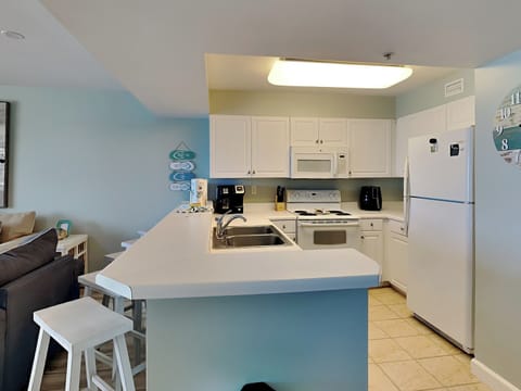 Condo, Multiple Beds, Ocean View (Pelican Isle #511 - No Pets Allowed) | Private kitchen | Fridge, oven, dishwasher, coffee/tea maker