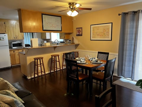 Family/dining room looking into kitchen and granite dining counter
