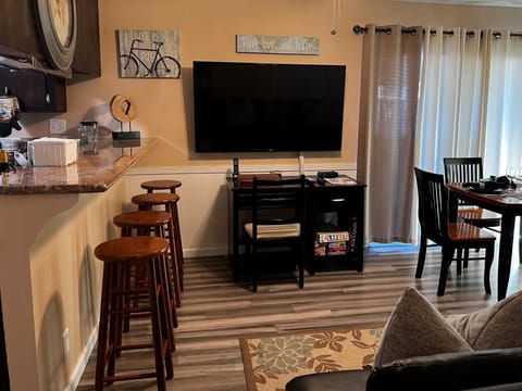 Family/Dining Room - dining table, desk w/chair, LCD TV, dining counter for 4