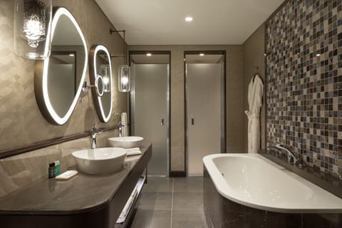 Premium Suite, 1 Bedroom, Balcony | Bathroom | Shower, rainfall showerhead, eco-friendly toiletries, hair dryer