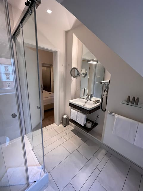 Economy Double Room | Bathroom | Designer toiletries, hair dryer, towels, soap