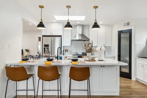 More seating and surfaces in the full kitchen.