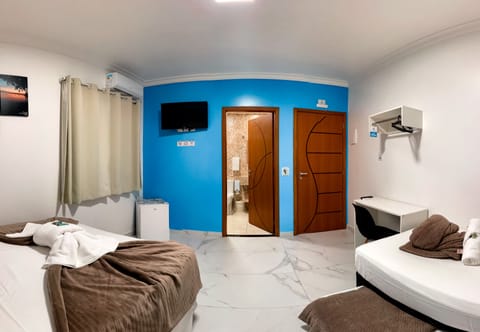 Standard Quadruple Room | Minibar, desk, free WiFi, bed sheets