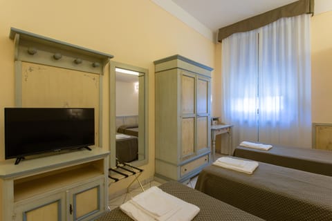 Desk, free WiFi, bed sheets