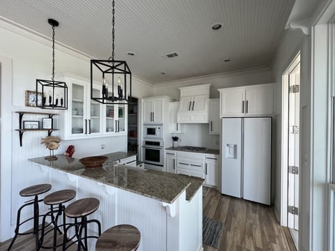 Kitchen with large walk-in pantry