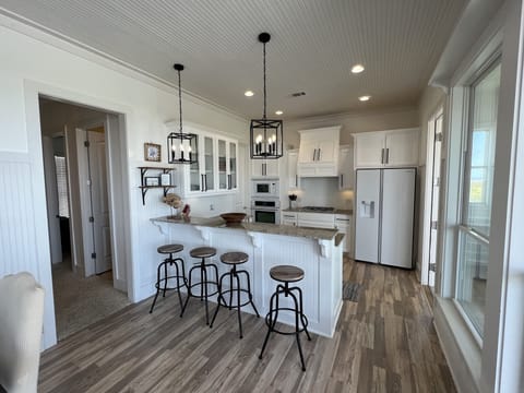 Kitchen opens to dinning room and living room
