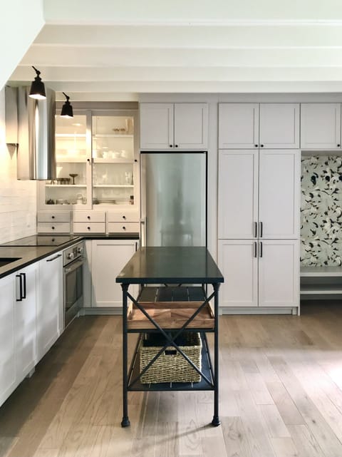 Washer and dryer are behind those cabinet doors!