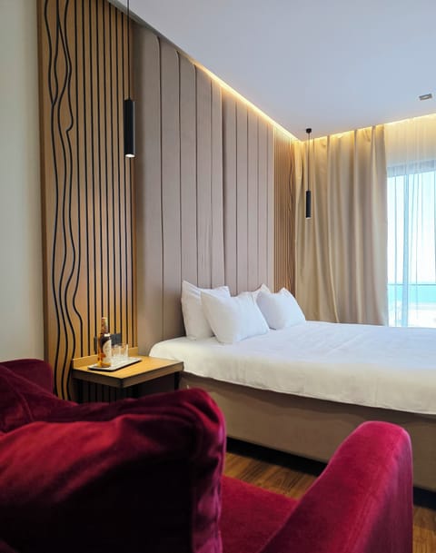 Luxury Double Room, Partial Sea View | 1 bedroom, Frette Italian sheets, premium bedding, down comforters