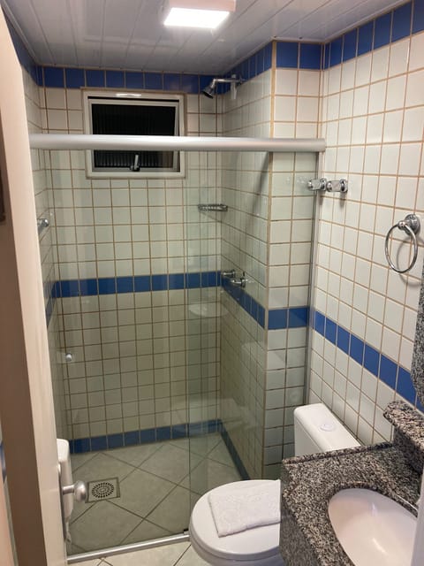 Standard Room | Bathroom | Shower, hair dryer, soap, shampoo