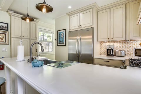 Cook up a feast in the sleek kitchen.