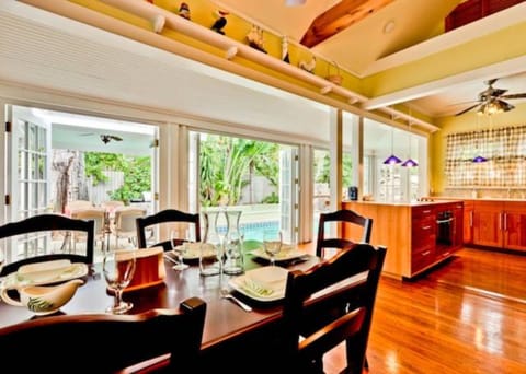 Indoor dining area opens to the outdoors.