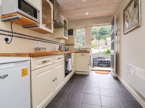 Fridge, electric kettle, toaster, cookware/dishes/utensils