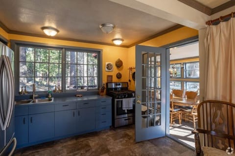 Off site Creekside Cottage 2 story Sleeps 7 | Private kitchen | Microwave, eco-friendly cleaning products