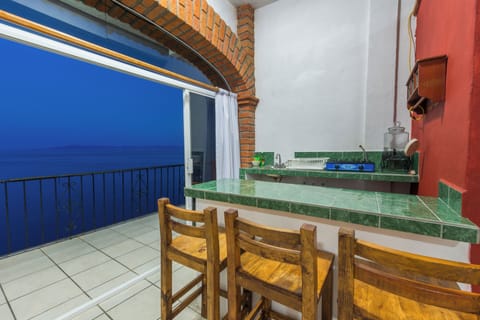 Grand Room, 2 Double Beds, Non Smoking, Ocean View | Private kitchen | Mini-fridge, microwave, blender, cleaning supplies