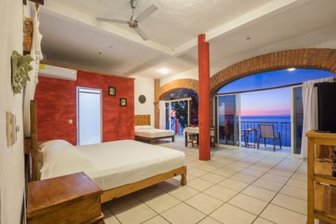 Standard Room, 2 Double Beds, Non Smoking, Ocean View | Minibar, individually decorated, individually furnished