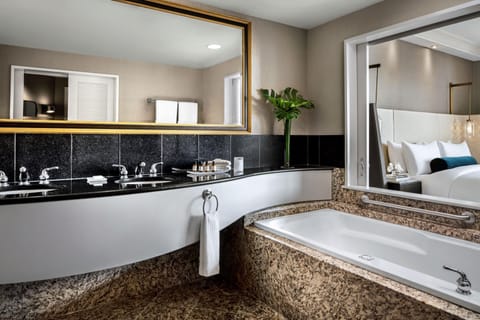 Separate tub and shower, jetted tub, designer toiletries, hair dryer