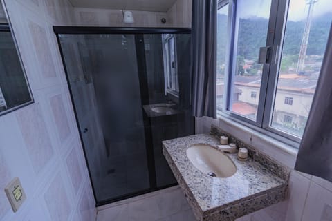 Deluxe Triple Room | Bathroom | Shower, towels, soap, toilet paper