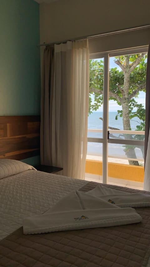 Deluxe Double or Twin Room, 4 Bedrooms, Sea View | Blackout drapes, free WiFi, bed sheets