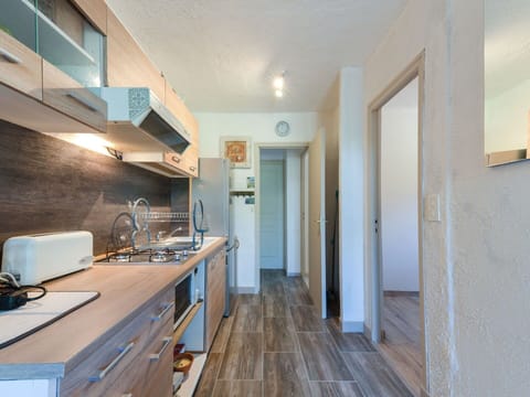 Cabinetry, Countertop, Furniture, Tap, Building, Wood, Interior Design, Drawer, Kitchen, Flooring