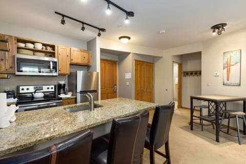 Breakfast bar with seating for three.