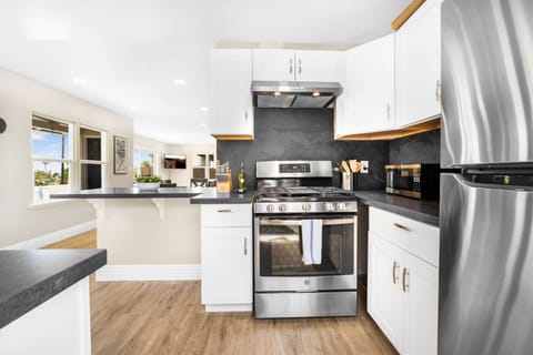 Ample kitchen stocked with cooking essentials!