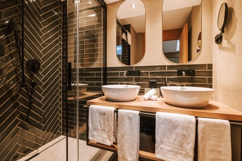 Panoramic Loft | Bathroom | Designer toiletries, hair dryer, heated floors, soap