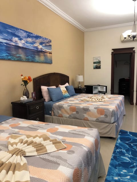 Junior Room (Cielo) | Premium bedding, down comforters, individually decorated