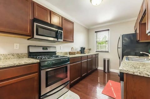 Plenty of cabinet space loaded with dishes, pots, pans, etc.