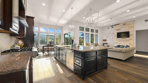 The spacious kitchen is open to the living and dining areas.