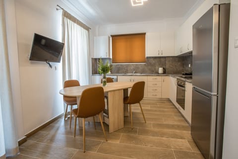 Comfort Apartment | Private kitchen | Full-size fridge, stovetop, espresso maker, electric kettle