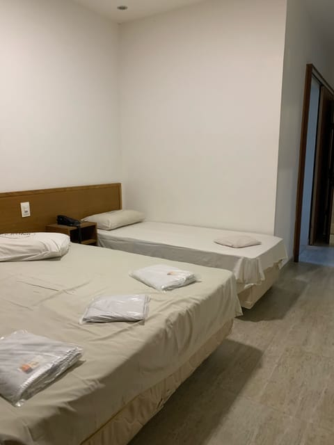 Economy Triple Room | Laptop workspace, free WiFi, bed sheets